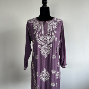 Purple short kurti with white floral embroidery, displayed on a black mannequin